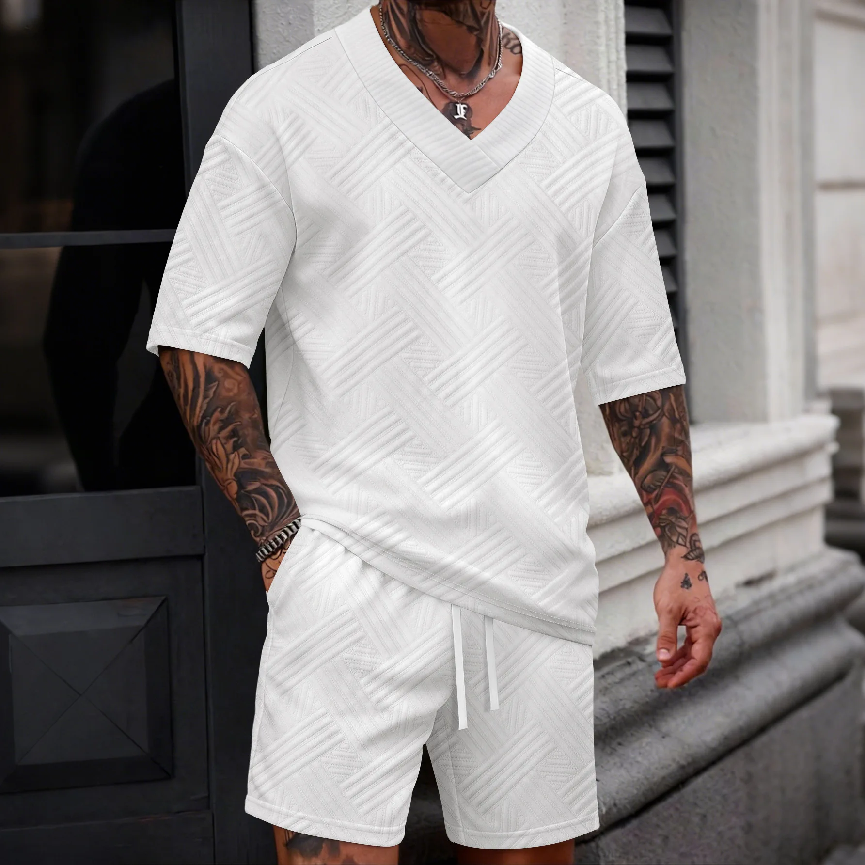 

New men's V-neck trendy and fashionable textured suit - short-sleeved T-shirt and fitted shorts - casual summer outfit