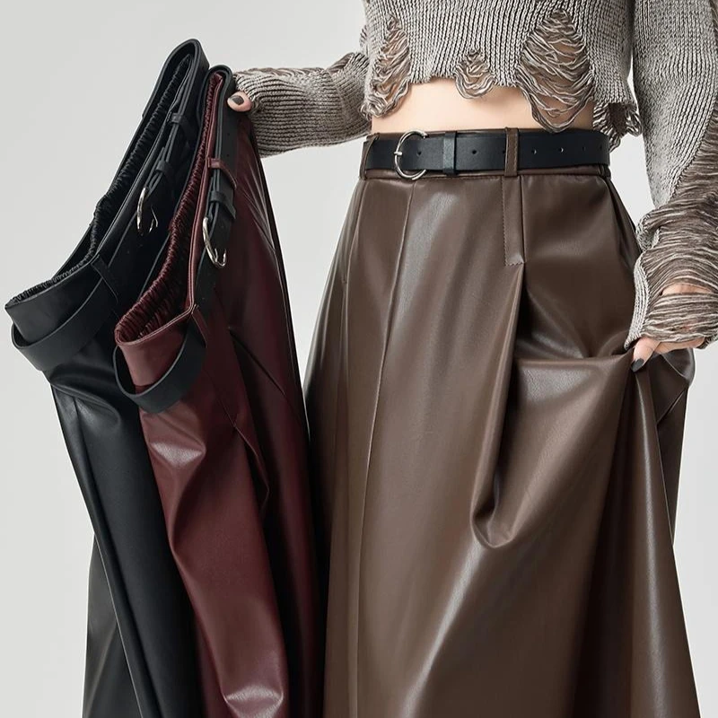 Séoulish automne hiver PU cuir femmes parapluie jupes longues avec ceinture 2025 nouveau Vintage taille haute ample a-ligne jupe femme