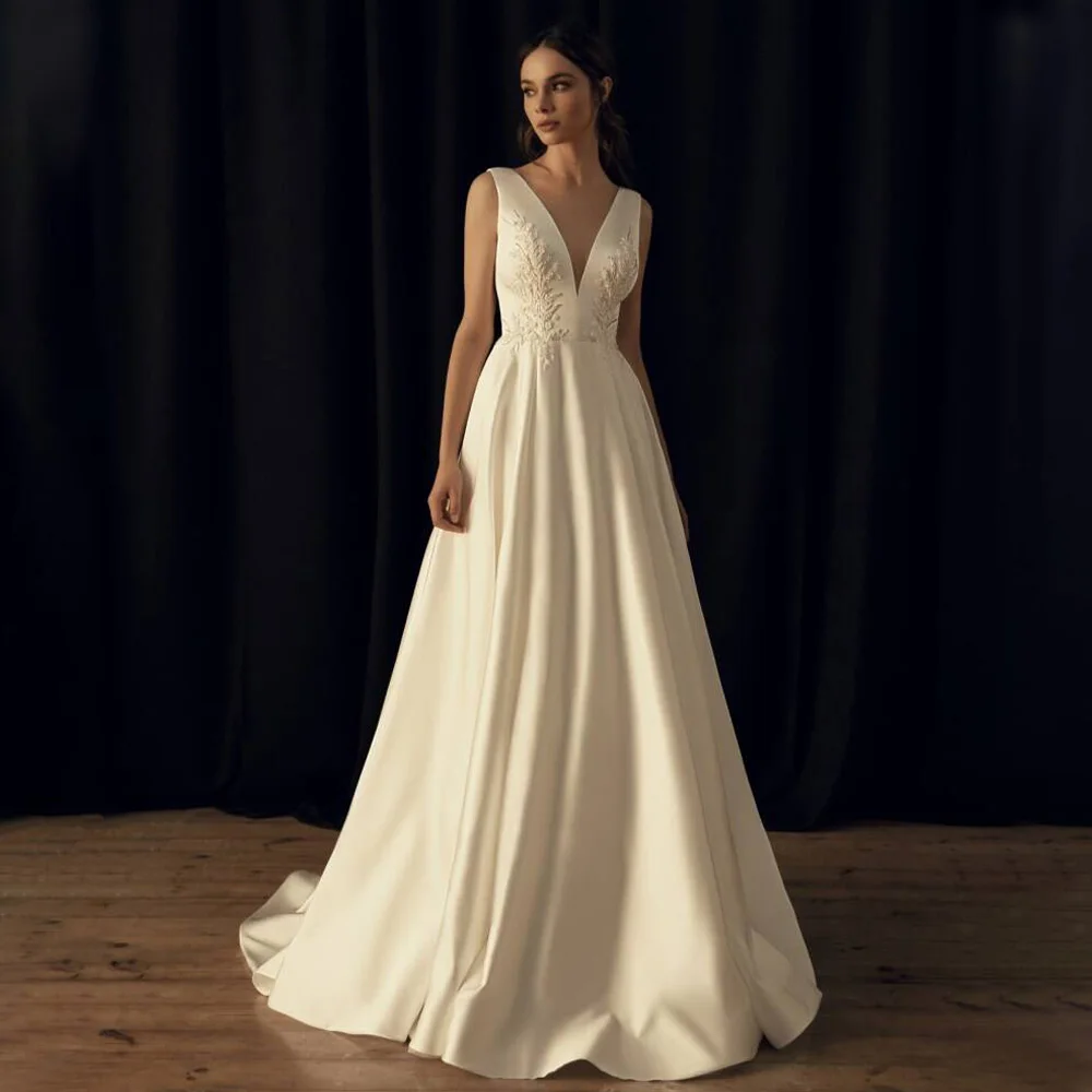 A Line Wedding Dresses for Women 2023 Bride V Neck Satin Wedding Gowns Long Beaded Applique Backless Sweep Train Bridal Dress