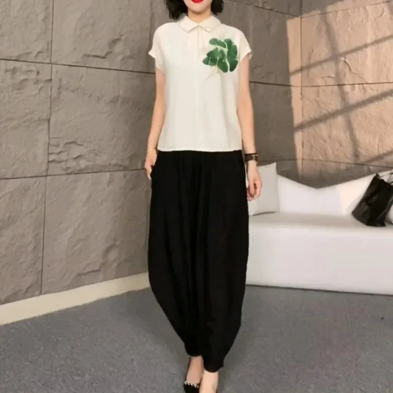 2025 Stampa femminile Top Pantalons Abito a due pezzi Pantaloni moda donna coreana Pantaloni lanterna manica corta da donna estiva 2 pezzi