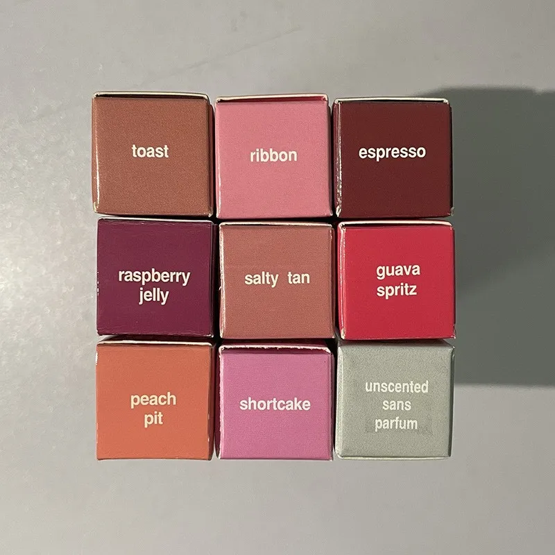 Nueva funda de teléfono bálsamo labial brillo de labios duradero caramelo vainilla tubo gris rollo de canela lápiz labial líquido tostado Espresso frambuesa