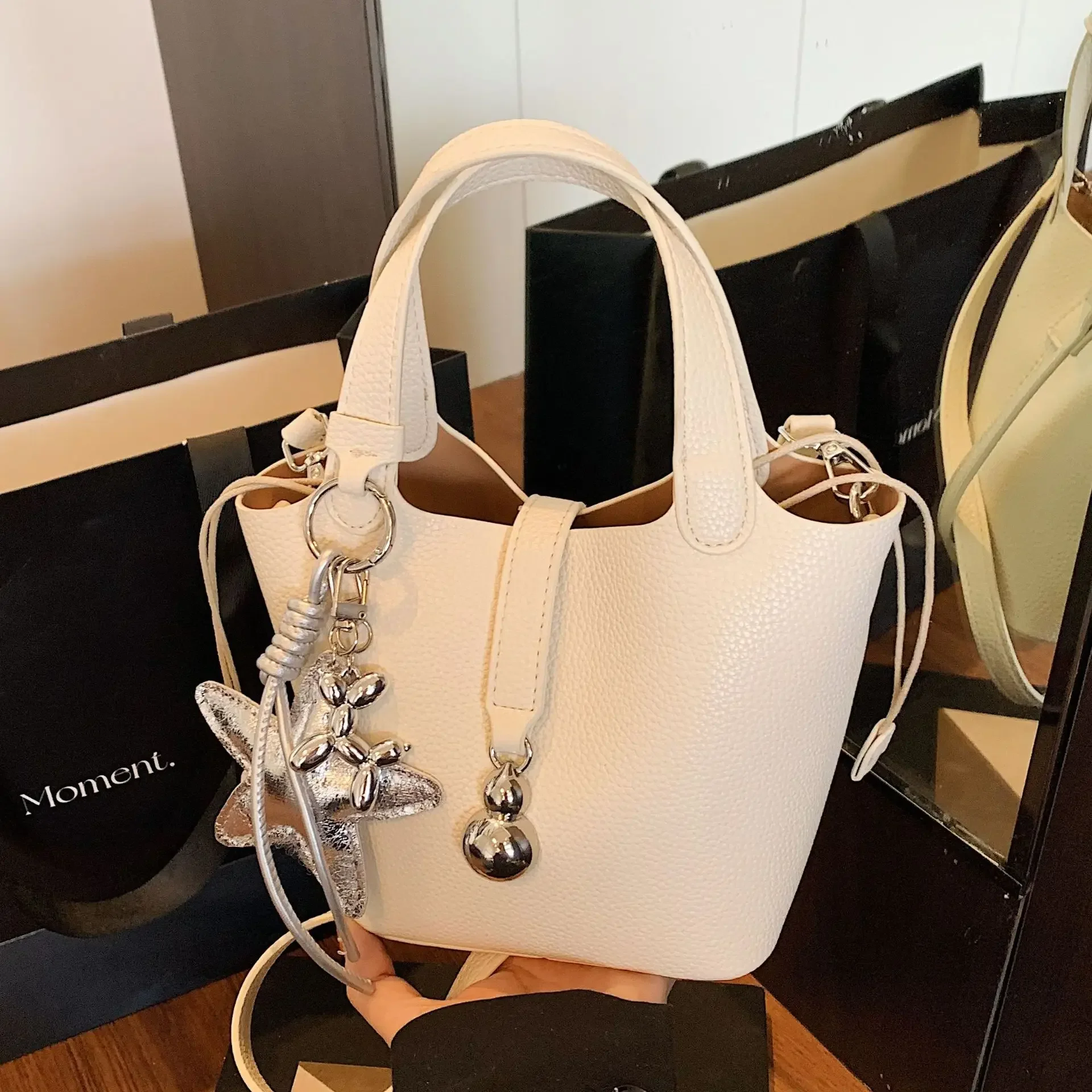 

Fashion Textured Small Bucket Bags for Women 2025 New Solid Color Soft Leather Handbags Lady Crossbody Bag with Pendant