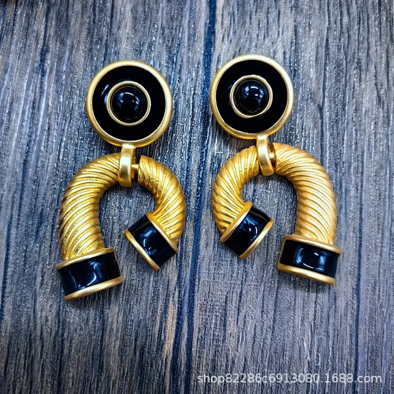 Electroplated gold retro, exaggerated design earrings