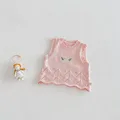 pink vest