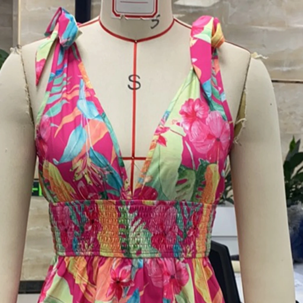 Abito da donna con scollo a V con spalle scoperte e fiocco Abito estivo senza maniche con stampa floreale a vita smock Mini abito corto e fluido per le vacanze casual