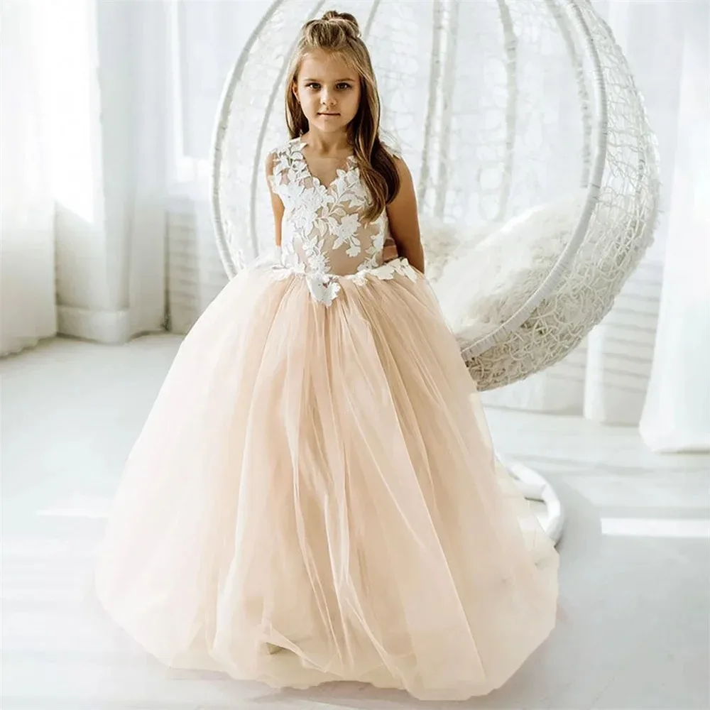 فساتين فتاة الزهور بدون أكمام لحفلات الزفاف مزينة بالدانتيل وحفلات أعياد الميلاد للفتيات الصغيرات فساتين التواصل الأول حسب الطلب