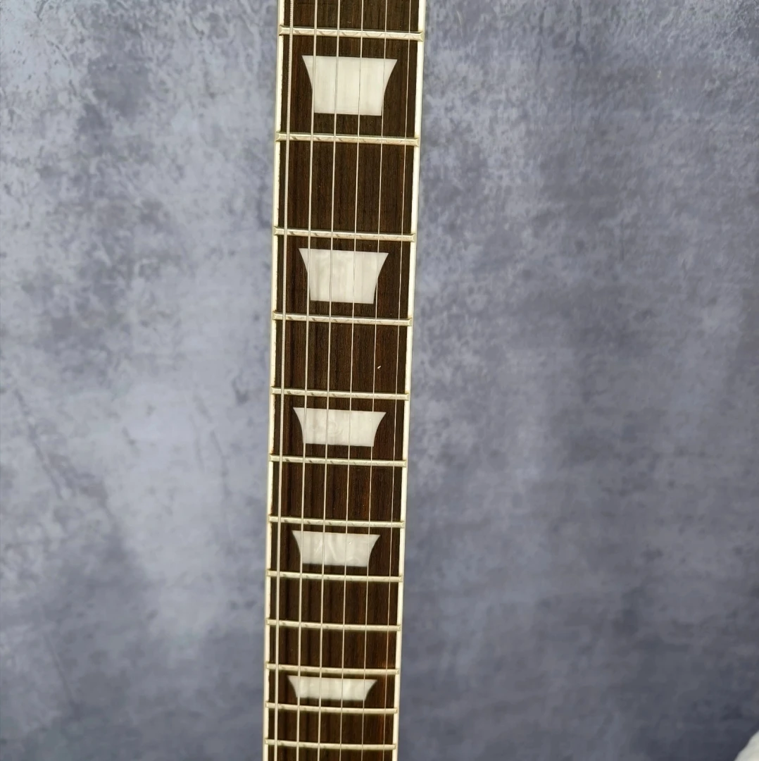 شحن مجاني جيتار كهربائي أصفر SG مع لوحة فريتس سوداء 2H أجهزة فضية لاقط