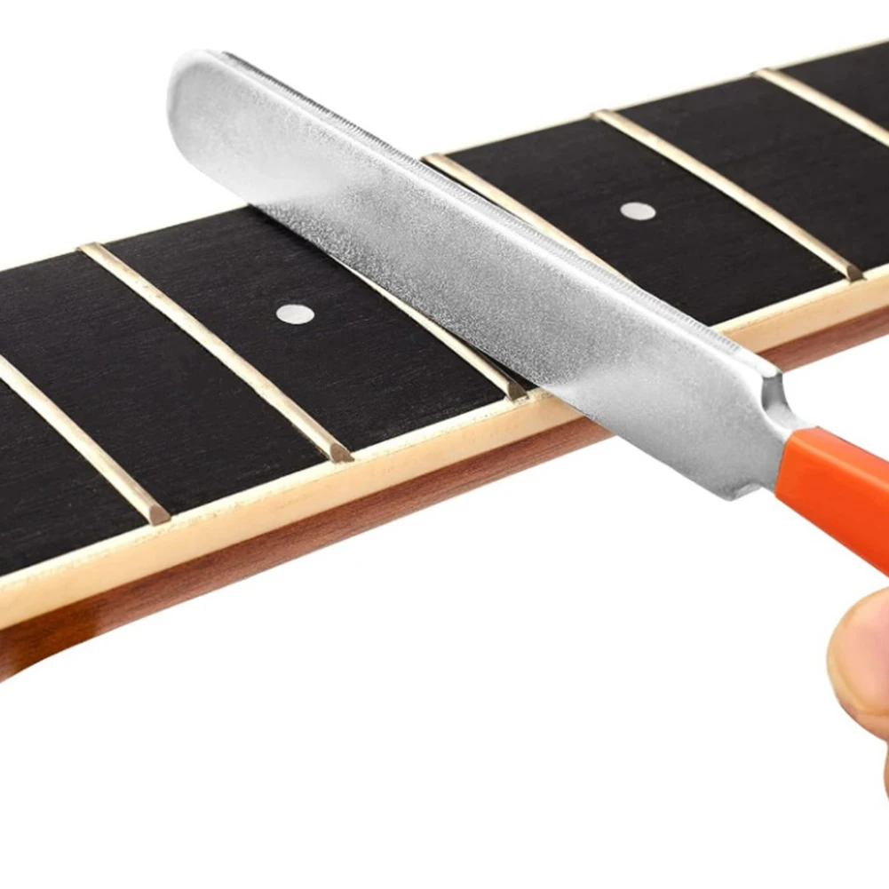 Guitar Technician's Essential Toolkit Features Sanding Beam Crowning File and Precision Fret Rocker for Optimal Setup