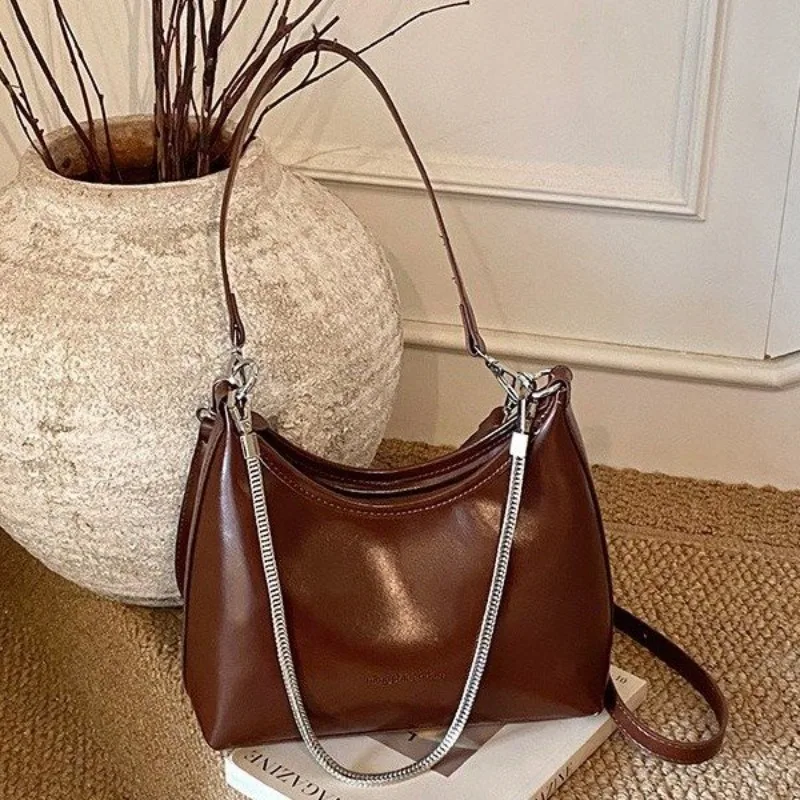 

Fashionable Retro Tote With Letter Logo Solid Color Also Functions As A Unique And Spacious Diaper Bag