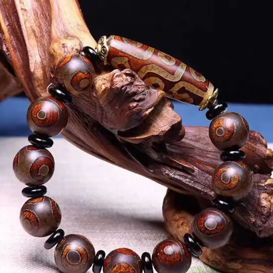 

Ethnic style nine-eye dzi bead red agate single ring bracelet, men's and women's retro bracelet, bracelet, bracelet.