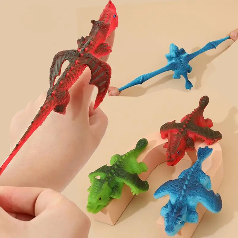 Slingshot Dinosaur Finger Toys 12pcs Finger Slingshot Dinosaurs Animal Toy Slingshot Dinosaur Finger Toys Stretchable Finger