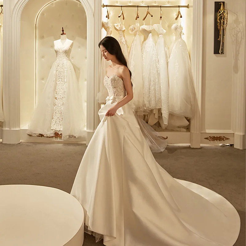 فستان زفاف خفيف جديد على طراز هيبورن الفرنسي من الدانتيل بدون أكتاف فستان استقبال أنيق للتخسيس