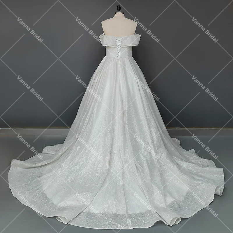 Schimmerndes, schulterfreies Brautkleid aus Tüll mit V-Ausschnitt und Schnürung, flauschiger Pinselschleppe, luxuriöse, individuelle, echte Fotos, glänzende Brautkleider