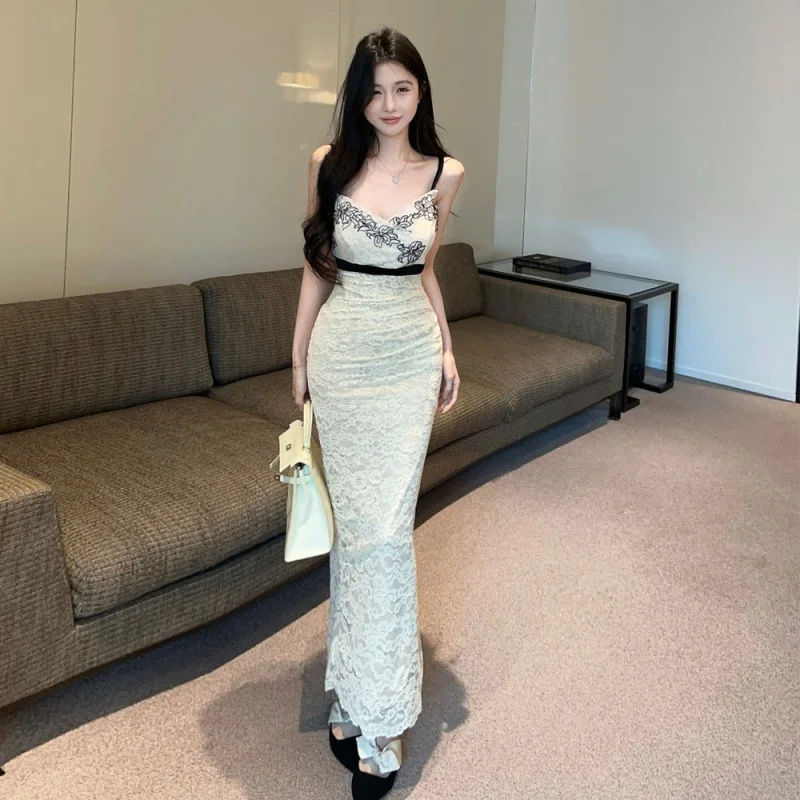 

2961Европа и Америка2026Оптовая продажа для трансграничной торговли: сексуальное кружевное платье-комбинация, элегантное облегающее длинное платье