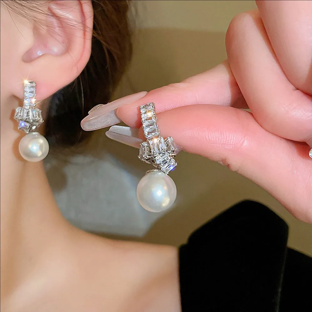 

Silvery-needle Zircon Knotted Pearl Earrings Fashionable and Elegant Light Luxury Jewelry For Women