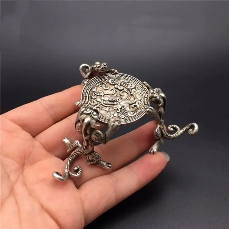 Chinese classical collection of small objects, study ornament decoration, silver and dragon three-legged candle holder, tea play