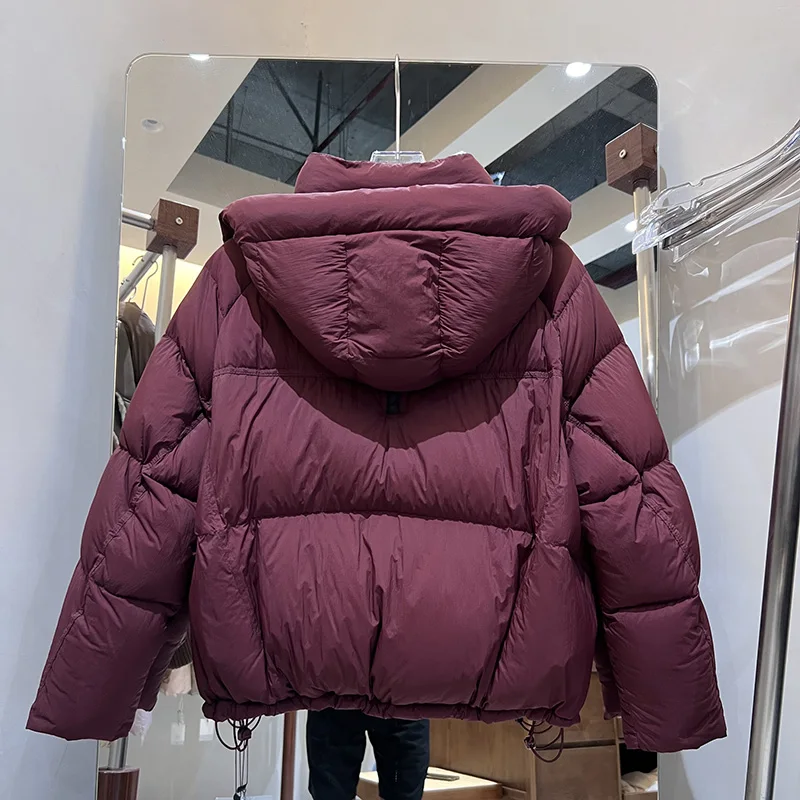 سترة سميكة دافئة بقلنسوة 2025 شتاء جديد إمرأة بطة أسفل جودة عالية لينة المرأة أسفل سترة موضة النساء باركر H742