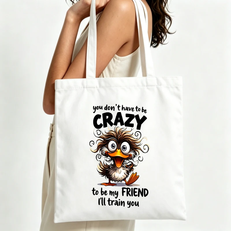 Women's cute bird graphic canvas tote bag with slogan print, ideal for casual daily use and weekend outings