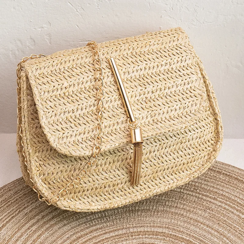 Fashion trend woven bag 2022 all-match one-shoulder slanted chain change makeup straw women\'s bag