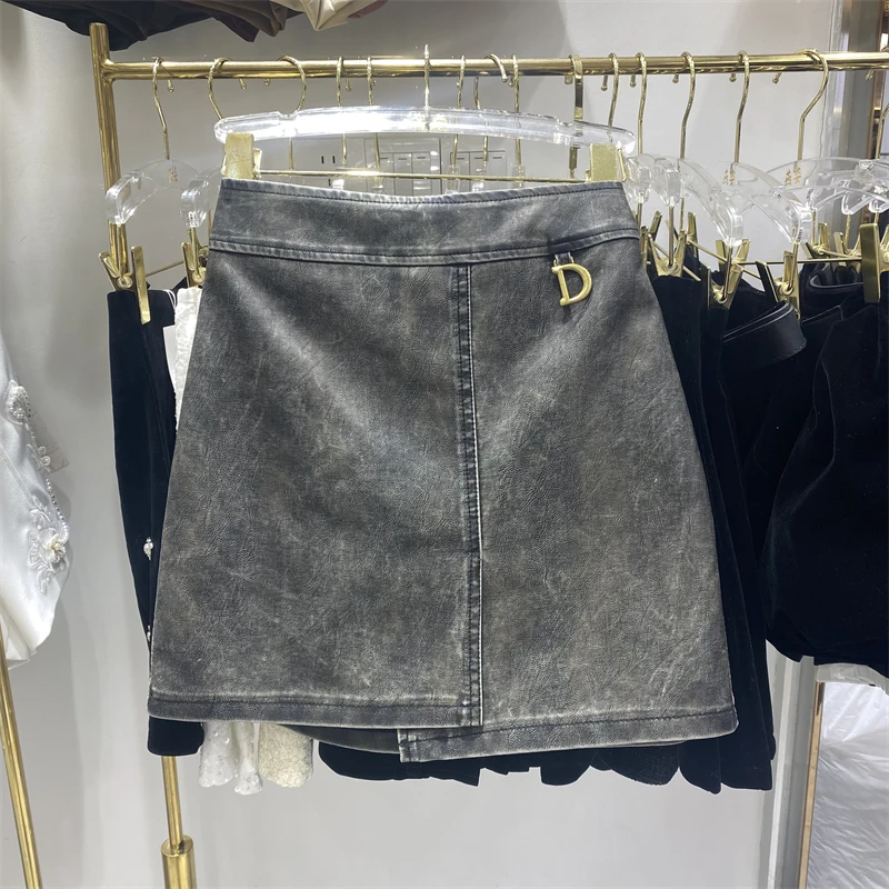 تنورة نصف جلد PU بمزاج متطور لخريف المرأة، تنورة قصيرة جديدة للفتيات الحارة بتصميم عتيق عالي الخصر على شكل حرف a #1