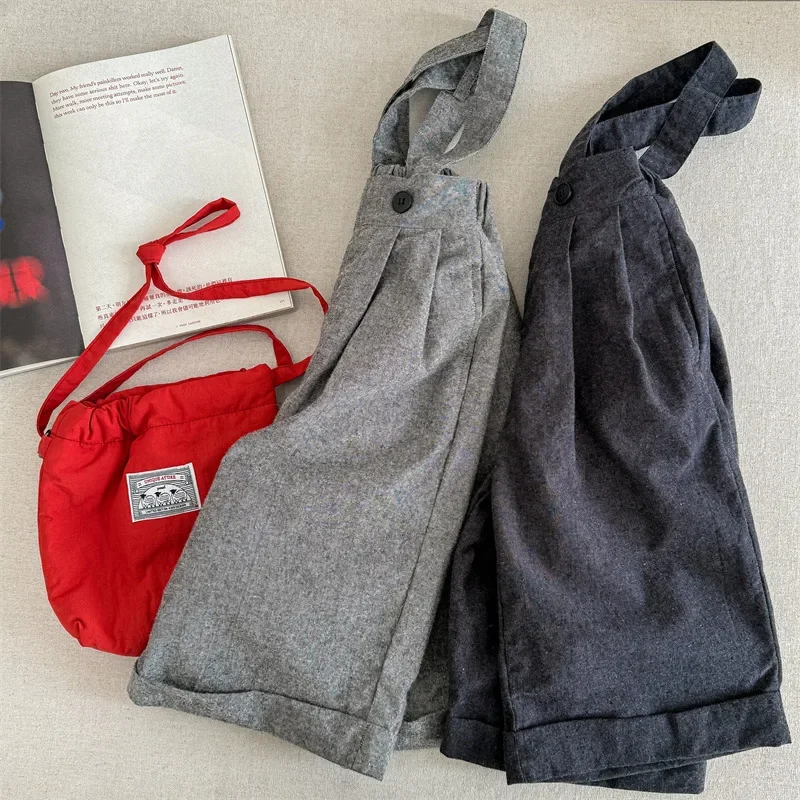 2025 ربيع ملابس الأطفال ملابس الربيع الأطفال النسخة الكورية حزام السراويل نحى تسعة سنت السراويل بنطال ذو قصة أرجل واسعة