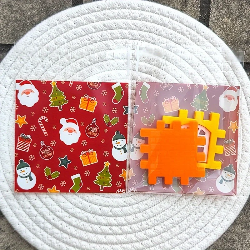 100 قطعة من أكياس هدايا عيد الميلاد ذاتية اللصق، سانتا احتفالية، شجرة، رجل خبز الزنجبيل لتزيين العطلات، هدايا الحفلات