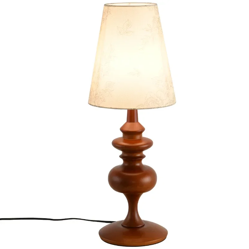 

French medieval desk lamp, bedroom, study, American retro wabi-sabi designer, high-end atmosphere, solid wood bedside lamp