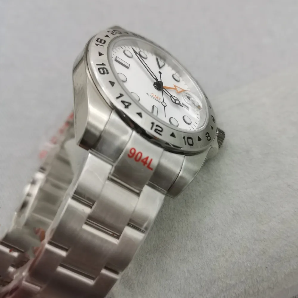 นาฬิกาสเตนเลสสตีลกระจกแซฟไฟร์40มม. 43มม. แสดงสองโซนเวลาการเคลื่อนไหวอัตโนมัติ Nh34gmt ญี่ปุ่น