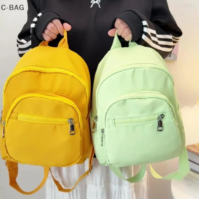 กระเป๋าเป้สะพายหลังขนาดเล็กสำหรับผู้หญิงอเนกประสงค์ กระเป๋าเดินทางน้ำหนักเบาขนาดกะทัดรัดพร้อมช่องใส่ของหลายช่อง