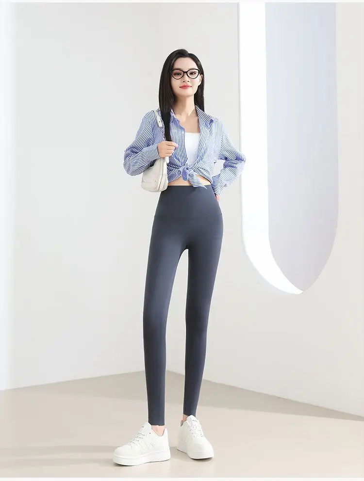 กางเกงเลกกิ้งผู้หญิงสีขาวทรงเข้ารูปสำหรับออกกำลังกาย กางเกงขายาวทรงสปอร์ต ซิปหลัง กระชับรูปร่าง ใส่ทำงานได้ เนื้อผ้านุ่มฟู เหมาะกับฤดูใบไม้ร่วง เอวสูง