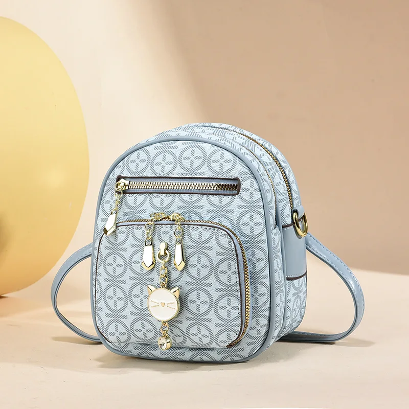 

Quality Leather Women's Crossbody Backpack Girl Bag New Summer Student Versatile Shoulder Small squar Bag Design Mini Backpack