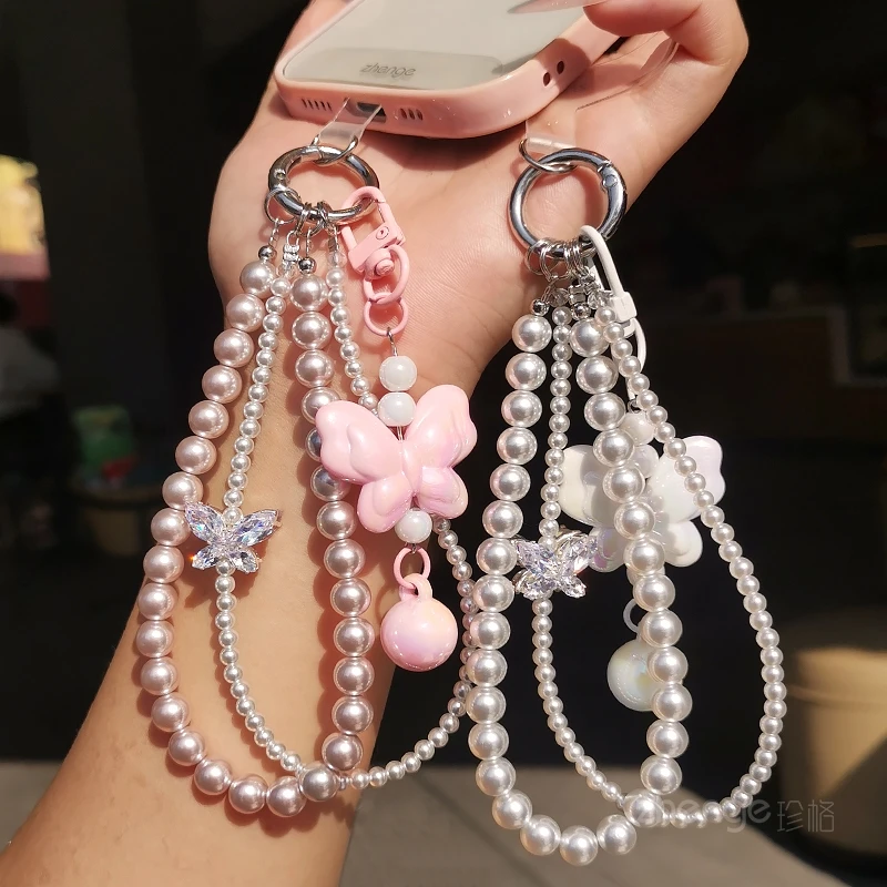 

Ремешок для мобильного телефона, жемчужный бант, двухслойный браслет, женский модный новый продукт с защитой от потерь на открытом воздухе