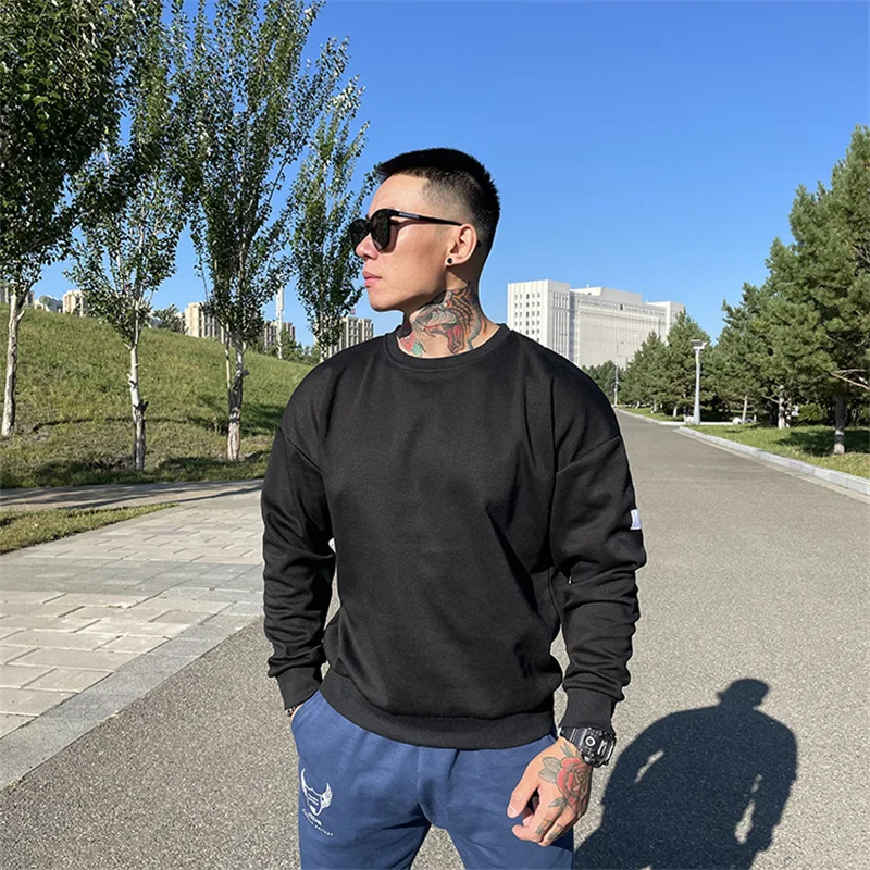 

Autumn Winter Loose Sweatshirts Male Gyms Fitness Bodybuilding Joggers Sportswear Fashion Training Cotton Hoodies Men pullover