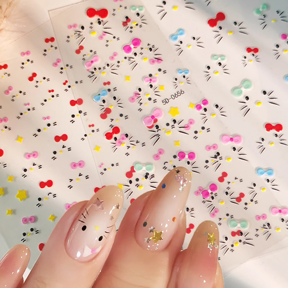 2 fogli simpatico gattino faccia adesivi per unghie cartone animato 5D fiocchi rosa pentagramma felice decalcomanie per unghie fai da te Y2K dolci ragazze inverno unghie Decor