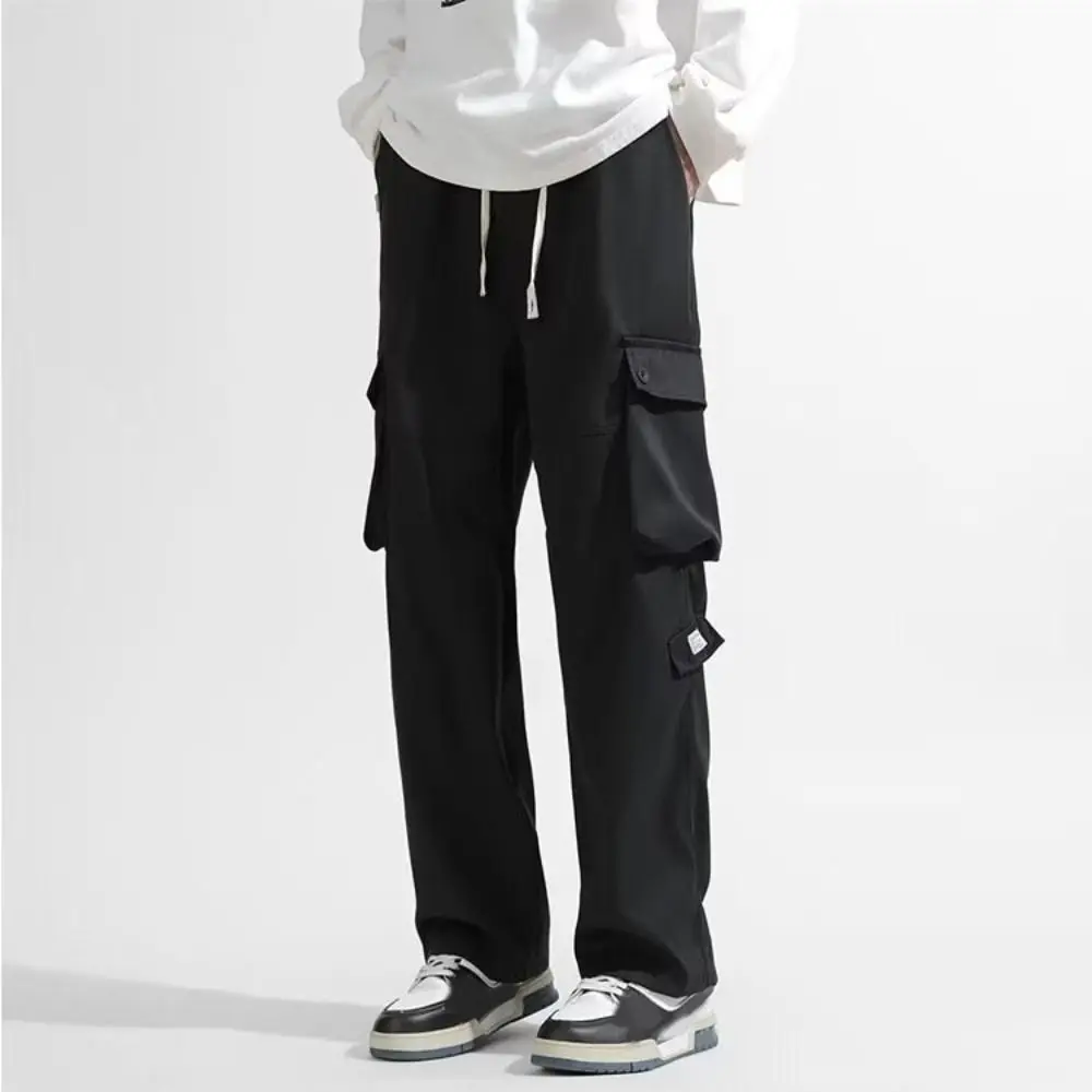 الهيب هوب السراويل الرباط واسعة الساق Sweatpants متعددة جيوب المتضخم السراويل البضائع الفضفاضة Y2K فضفاض الرجال ركض بنطلون الشارع الشهير