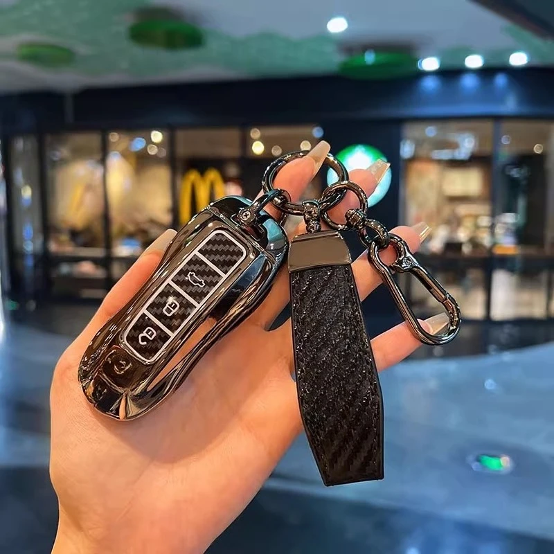 

Suitable for Porsche key protection case Cayenne Macan shell Panamera buckle 911/718 Taycan bag