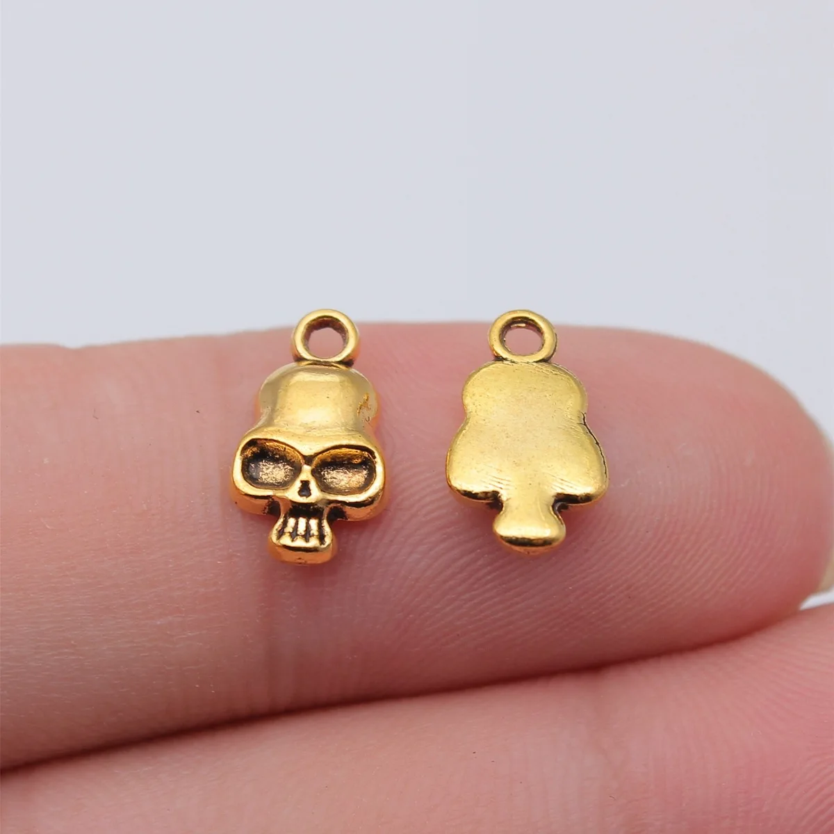 WYSIWYG 20 sztuk 13x7mm antyczne srebro kolor czaszki Charms mała czaszka Charms Tiny czaszki Charms dla tworzenia biżuterii — zdjęcie 6