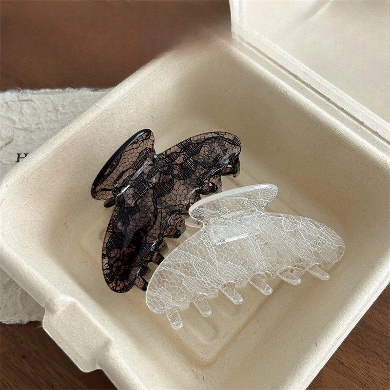 

Korean lace feeling grab clip black and white temperament personality niche back head disc hair shark clip hair accessories