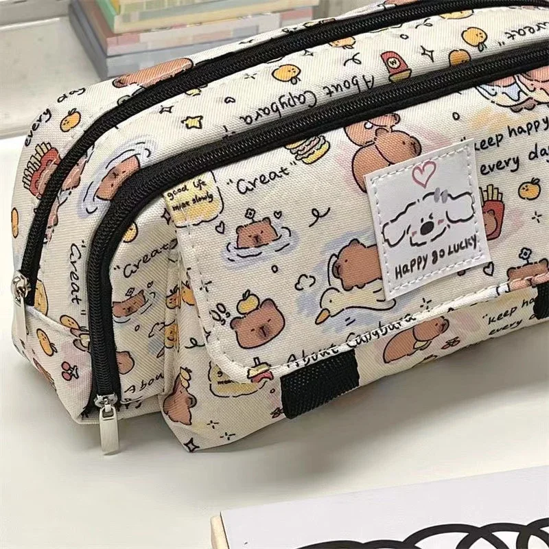 Estuches para lápices con tapa de capibara, estuche para lápices de dibujos animados a la moda, bolsa de almacenamiento de papelería Kawaii, bolsas de cosméticos, monedero