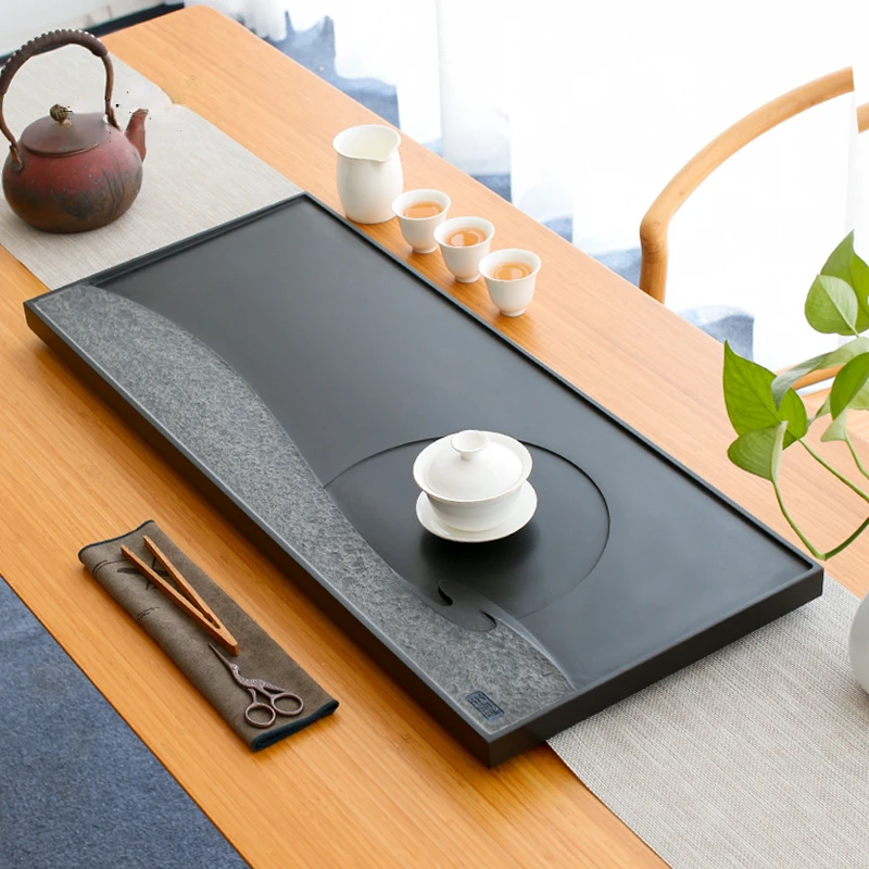 

Watching and making natural Wujinshi tea tray drainage tea table household simple tea sea office tea set embedded tea tray