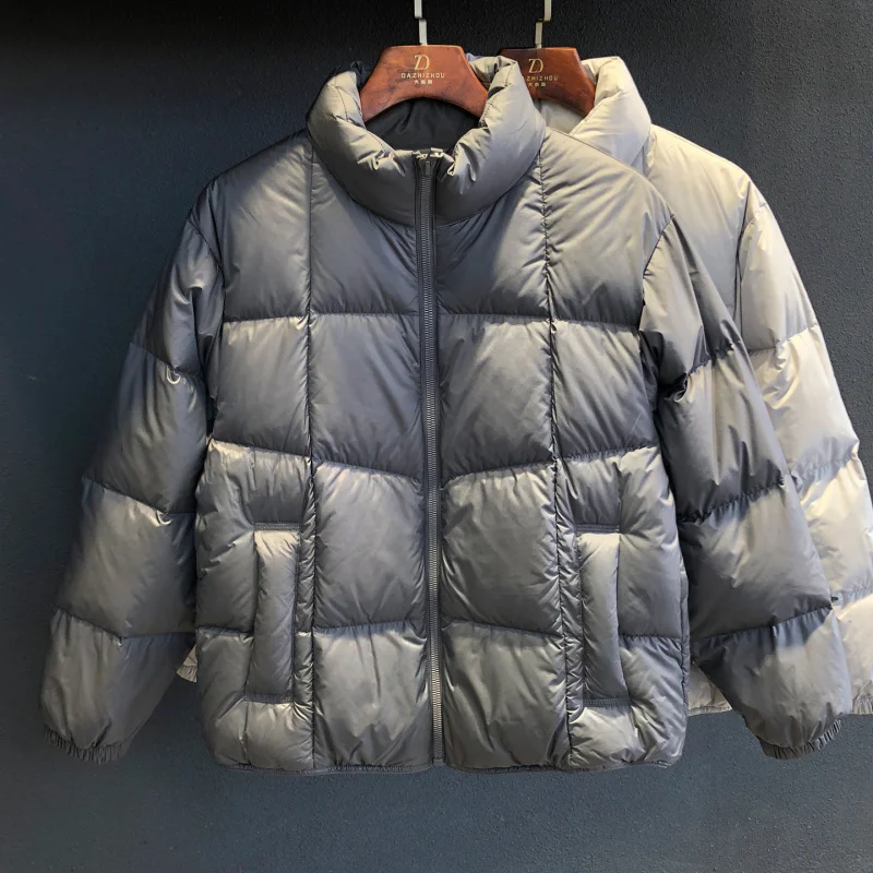 

Cold resistant down jacket men's loose warm jacket 2026 winter new outdoor fashion trend high-end coat