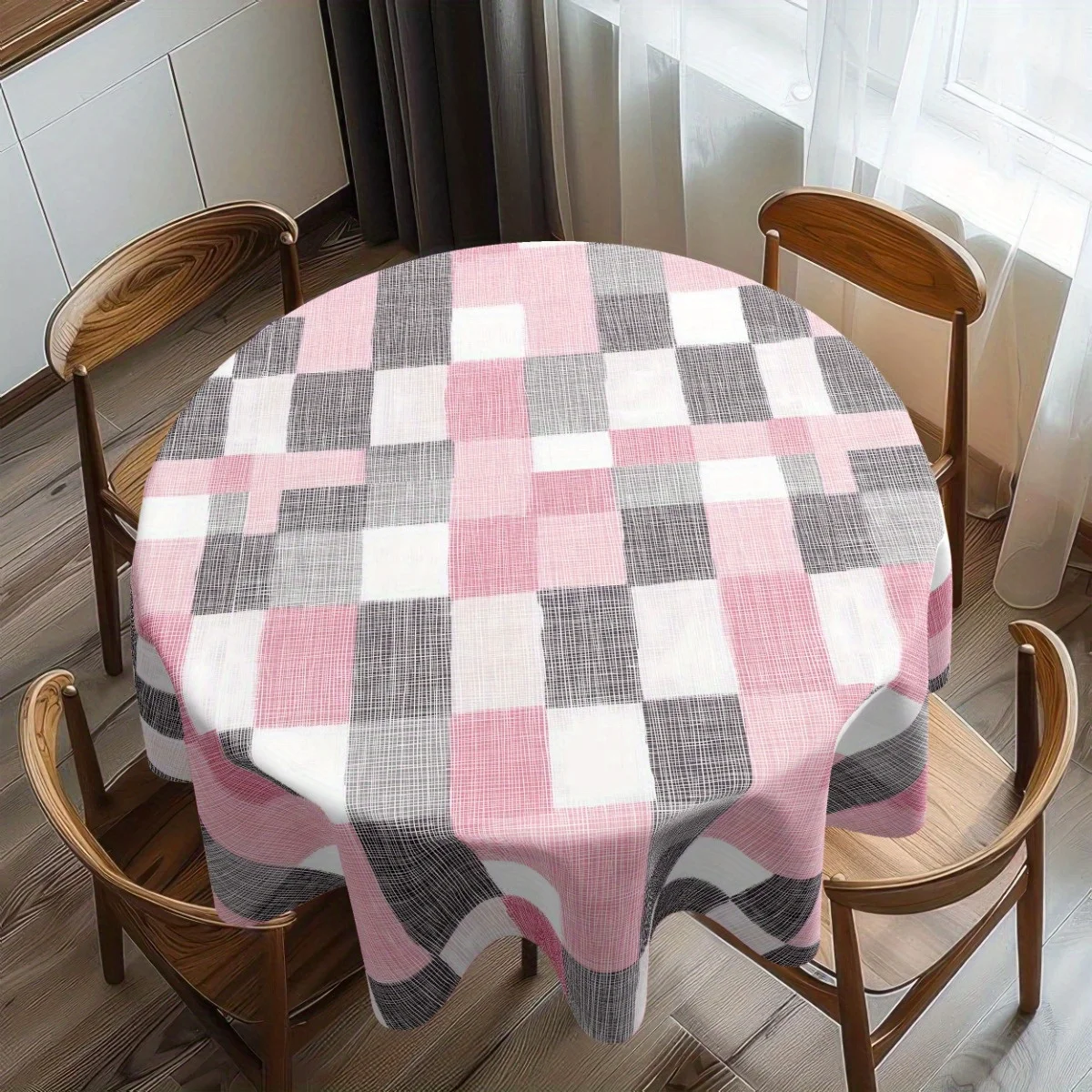 One grey, pink and white checked polyester tablecloth - for a birthday party