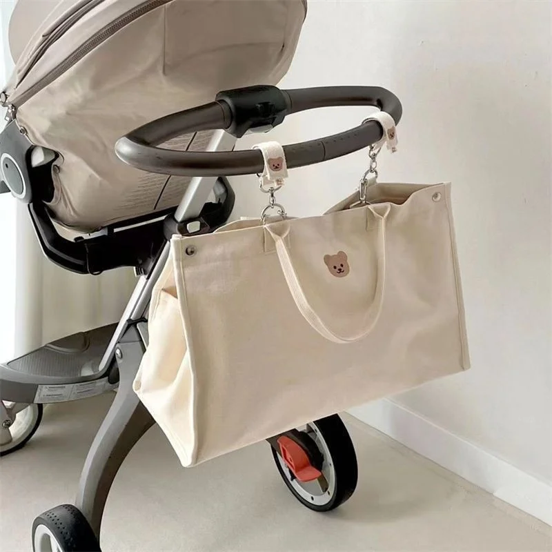 

Korean Mommy Bag New Multifunctional Large Capacity Going Out Maternal and Infant Bag Portable Canvas Maternal and Infant Bag