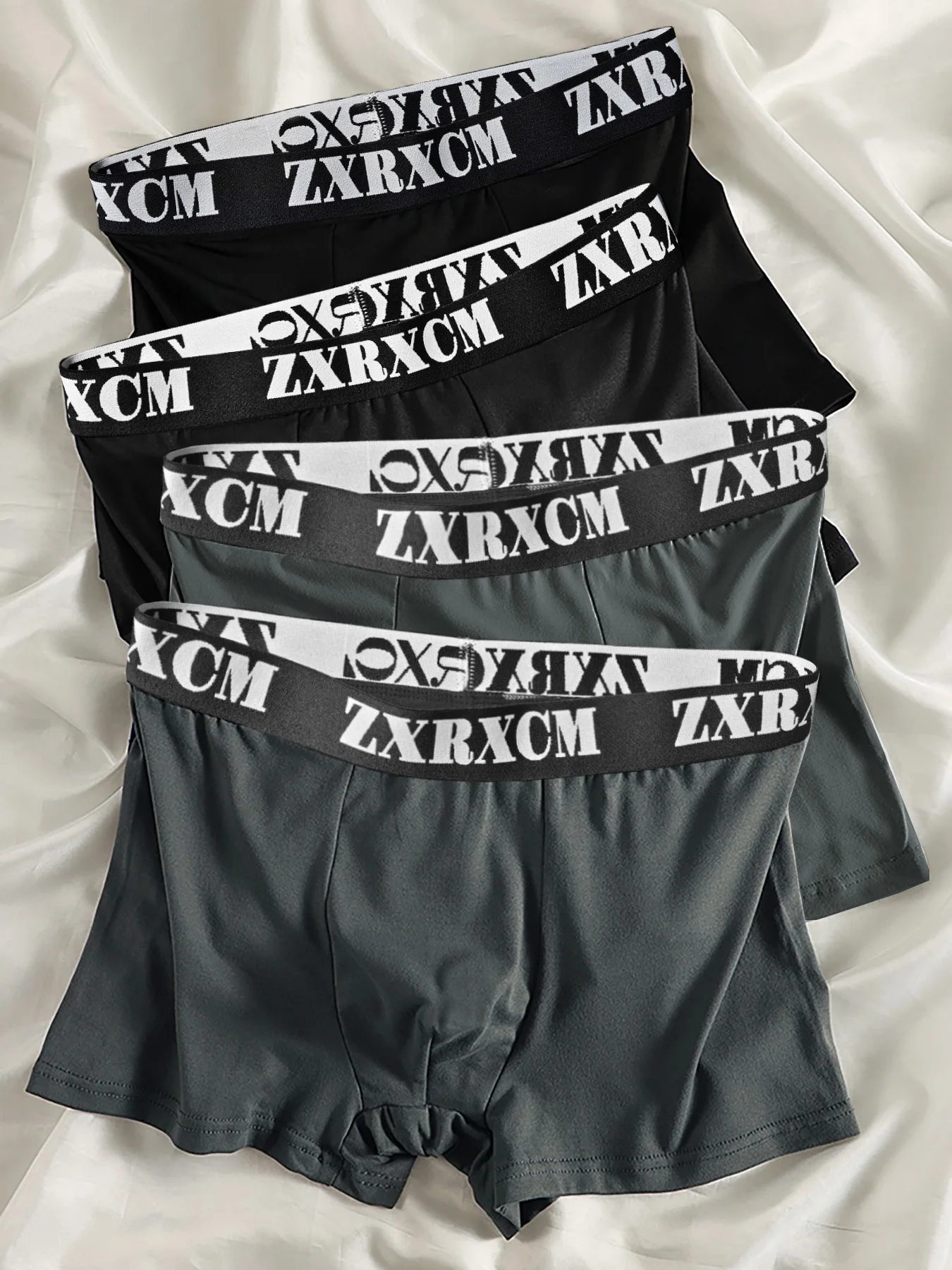 

4PCS Letter belt men's boxer shorts are breathable and comfortable. The black and gray color scheme is simple and practical