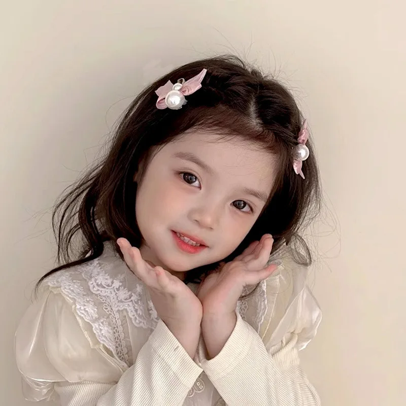ใหม่หวานโบว์ไข่มุกผมคลิปสําหรับเด็กผู้หญิงสีชมพู Bowknot เจ้าหญิงด้านคลิป Bangs คลิปเด็ก Barrettes อุปกรณ์เสริมผม