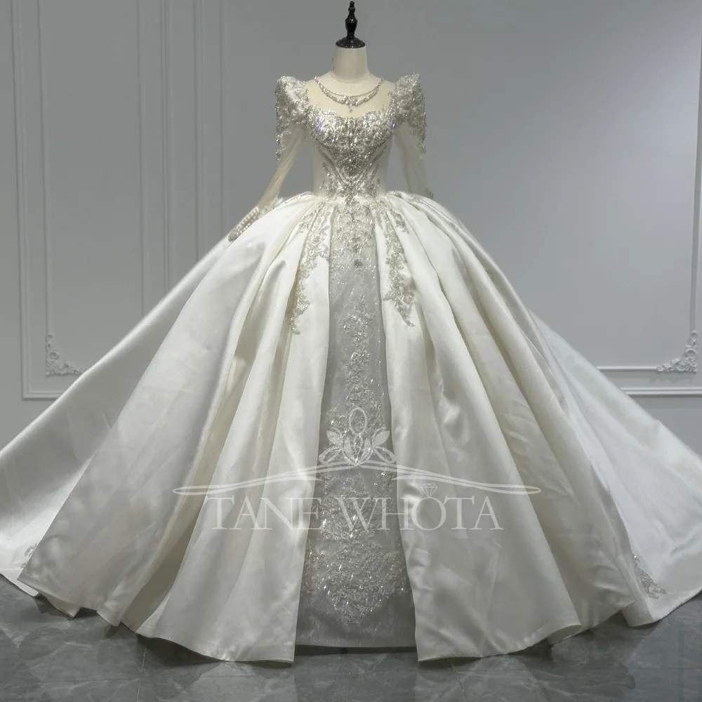 

Свадебное платье с круглым вырезом и длинными рукавами, расшитое кристаллами, бисером и блестками, со съемными оборками, на шнуровке с замочной скважиной сзади, настраиваемое бальное платье