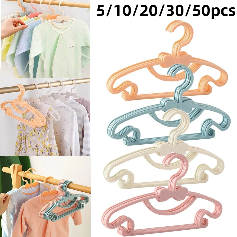 Perchas de plástico para bebé de 5 a 50 Uds., colgador de almacenamiento de ropa para niños, perchas antideslizantes bonitas portátiles, herramientas de almacenamiento de ropa y toallas para armario