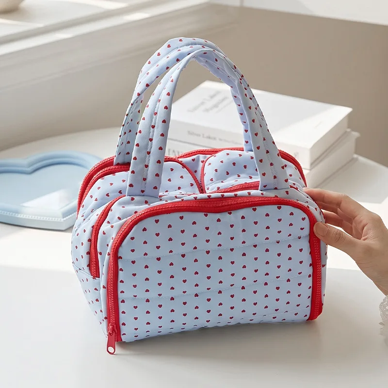 

Korean contrasting color love cosmetic bag padded cotton large capacity portable storage bag student travel toilet bag spot