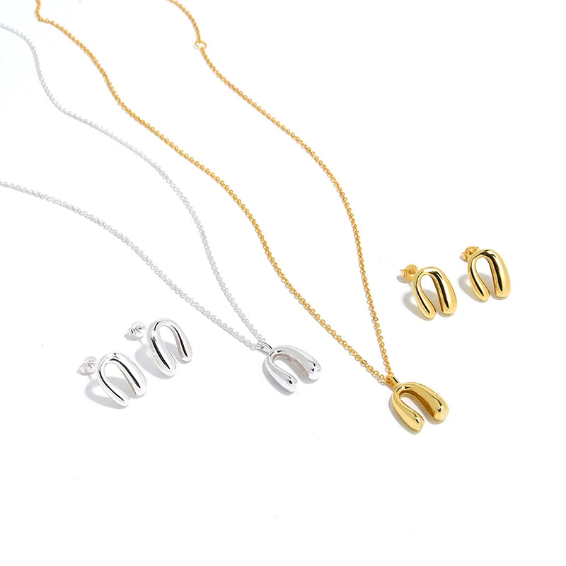 

Japanese exquisite and simple S925 silver gold-plated niche horseshoe necklace earring set, women's party gift free shipping