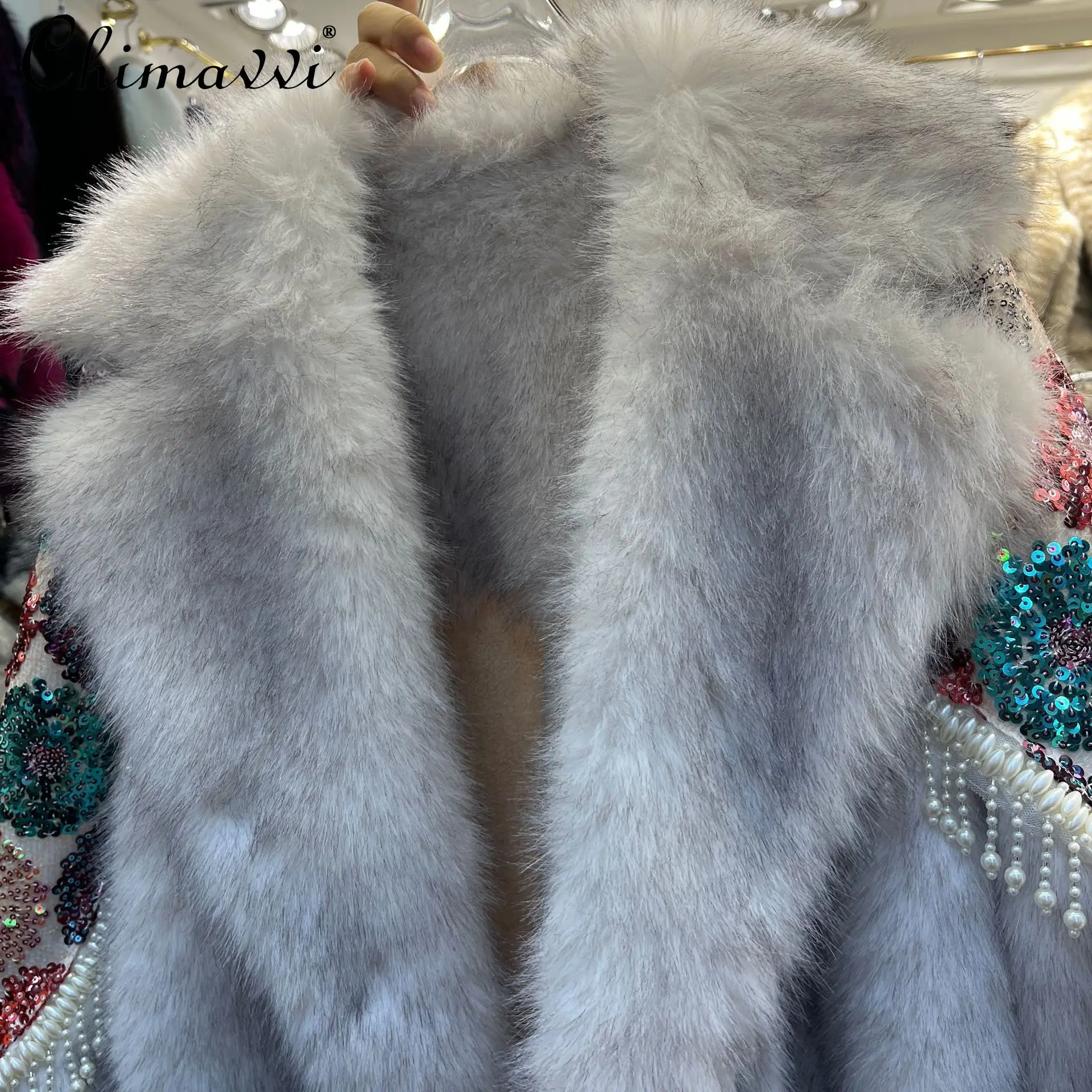 เสื้อโค้ทขนเฟอร์แฟชั่นระดับไฮเอนด์ใหม่สำหรับฤดูหนาวปี 2025 สำหรับผู้หญิง ประดับเลื่อมหนัก ทรงหลวม แขนยาว อุ่น สง่างาม แจ็คเก็ตขนเฟอร์เทียม